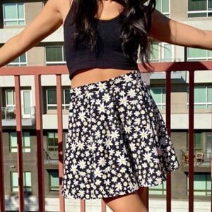 Ivory Ella XS Daisy print skirt black